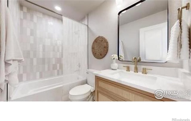 1325 11th Ave, Longmont, CO 80501 - full bath with vanity, toilet, and shower / tub combination