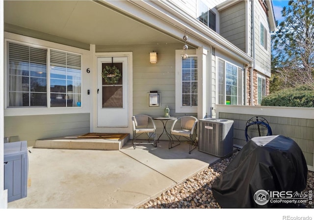 view of patio featuring central AC
