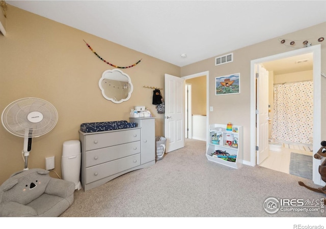 bedroom with carpet flooring and visible vents