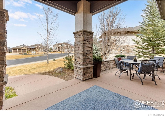 view of patio featuring outdoor dining space
