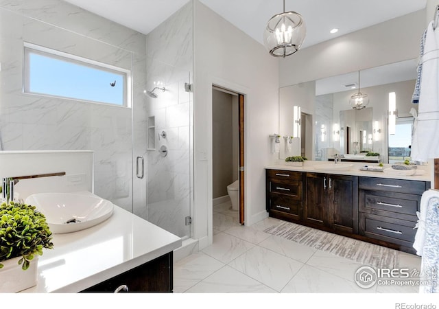 full bath with vanity, recessed lighting, toilet, marble finish floor, and a stall shower