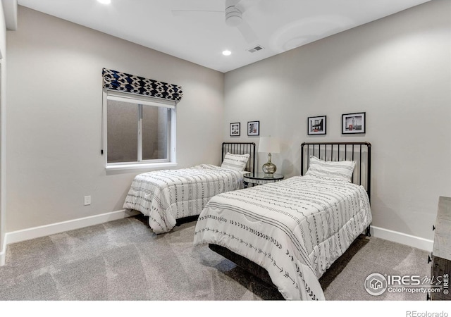 carpeted bedroom featuring baseboards, visible vents, recessed lighting, and a ceiling fan