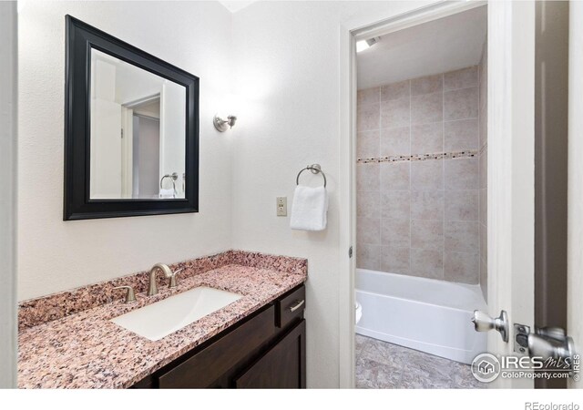 925 Columbia Rd Unit 233, Fort Collins, CO 80525 - bathroom featuring toilet, shower / tub combination, and vanity