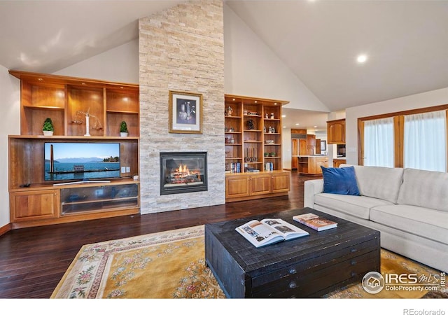 living room featuring a fireplace, high vaulted ceiling, and dark wood-style flooring
