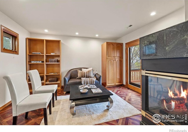 living room with visible vents and recessed lighting