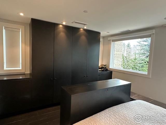 100 E Cooper Ave E Unit 7, Aspen, CO 81611 - bedroom with visible vents, recessed lighting, and dark wood finished floors