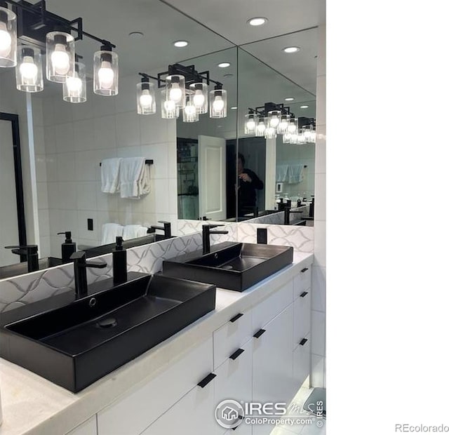 100 E Cooper Ave E Unit 7, Aspen, CO 81611 - bathroom with a sink, recessed lighting, and double vanity