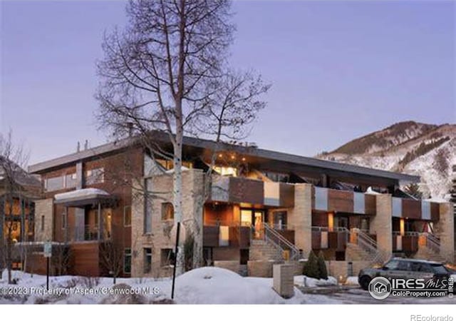 100 E Cooper Ave E Unit 7, Aspen, CO 81611 - view of front of home featuring stairway and a mountain view