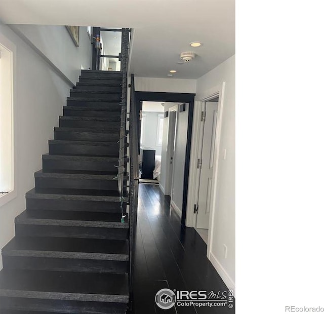 100 E Cooper Ave E Unit 7, Aspen, CO 81611 - staircase with recessed lighting, wood finished floors, and baseboards