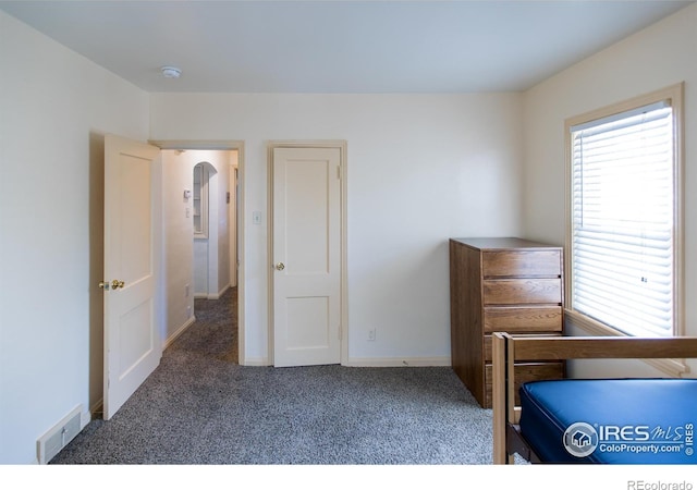 2229 10th Ave, Greeley, CO 80631 - unfurnished bedroom with carpet floors, baseboards, and visible vents