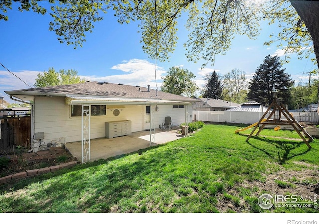2 Lincoln Pl, Longmont, CO 80501 - rear view of property with a patio and a playground