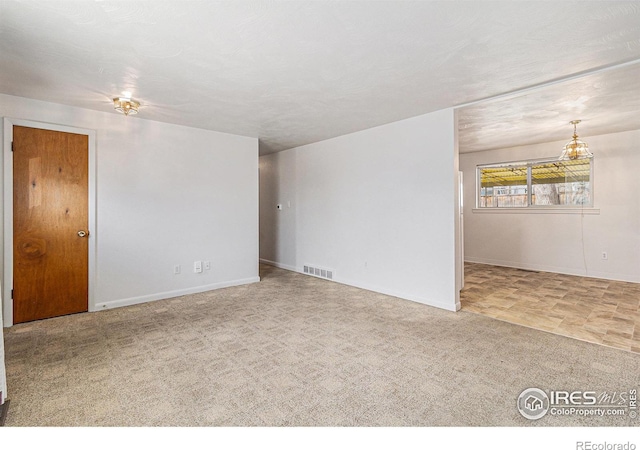 2 Lincoln Pl, Longmont, CO 80501 - unfurnished room with baseboards and carpet floors