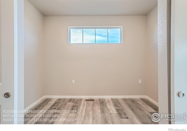 2387 Bristol St, Superior, CO 80027 - spare room with wood finished floors and baseboards