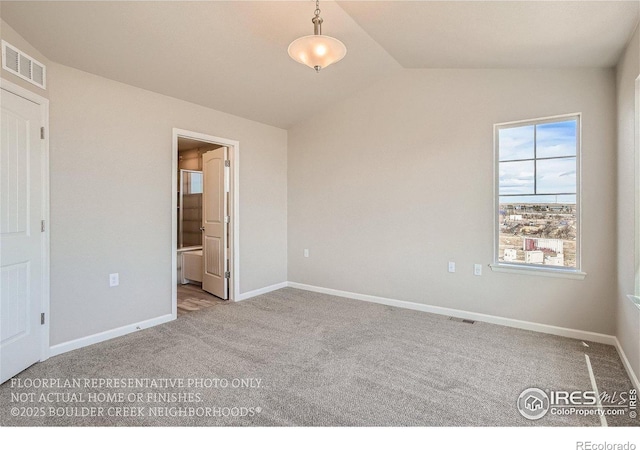 2387 Bristol St, Superior, CO 80027 - unfurnished bedroom featuring carpet floors, lofted ceiling, baseboards, and ensuite bathroom