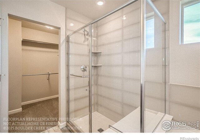 2387 Bristol St, Superior, CO 80027 - full bathroom featuring a shower stall, a spacious closet, and recessed lighting