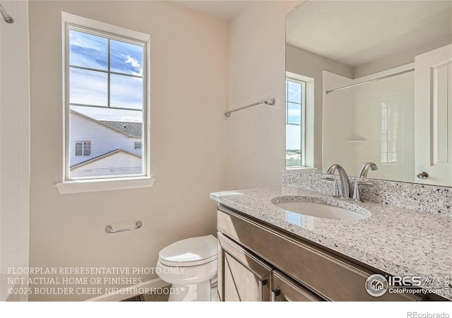 2387 Bristol St, Superior, CO 80027 - bathroom with healthy amount of natural light, toilet, and vanity