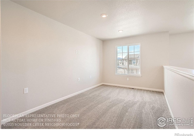 2387 Bristol St, Superior, CO 80027 - spare room featuring carpet flooring, baseboards, recessed lighting, and a textured ceiling