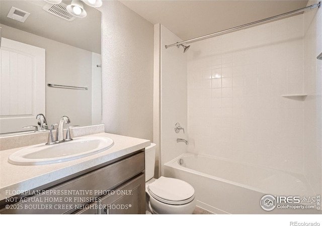 2387 Bristol St, Superior, CO 80027 - bathroom featuring toilet, vanity, tub / shower combination, and a textured wall