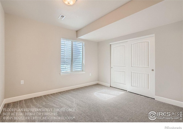 2387 Bristol St, Superior, CO 80027 - unfurnished bedroom with carpet, baseboards, and a closet