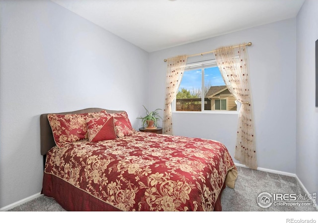 2747 Dafina Dr, Loveland, CO 80537 - bedroom featuring baseboards and carpet flooring