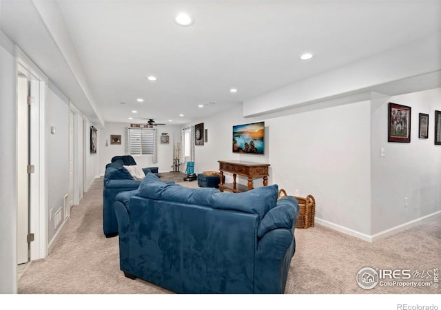2747 Dafina Dr, Loveland, CO 80537 - living room with recessed lighting, baseboards, and light carpet