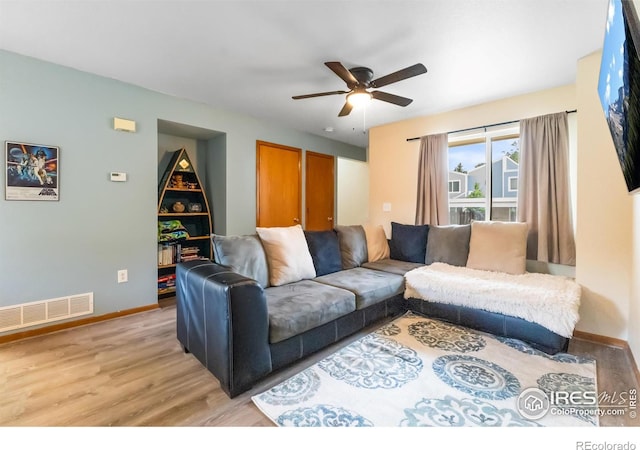 3005 Ross Dr Unit U17, Fort Collins, CO 80526 - living room featuring light wood-style floors and a ceiling fan