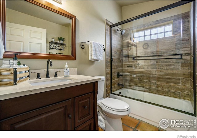 7889 Antelope Ct, Wellington, CO 80549 - full bathroom featuring toilet, vanity, and enclosed tub / shower combo