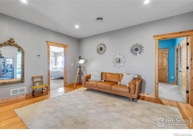 413 E Elm St, Lafayette, CO 80026 - living room with wood finished floors, recessed lighting, and baseboards