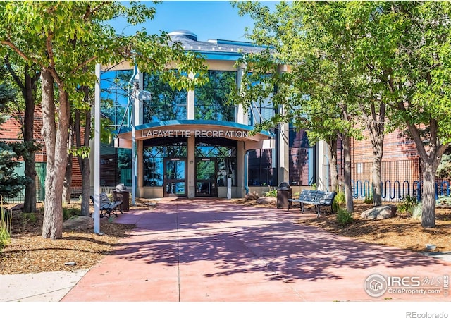 413 E Elm St, Lafayette, CO 80026 - view of building exterior featuring concrete driveway