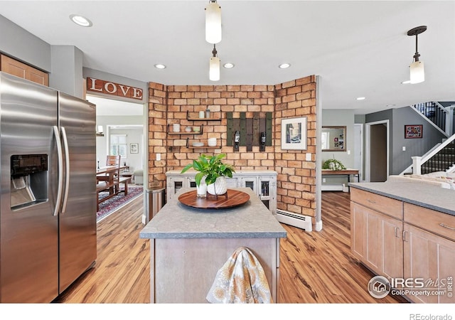 6850 Frying Pan Rd, Boulder, CO 80301 - kitchen featuring stainless steel fridge, baseboard heating, light wood finished floors, hanging light fixtures, and recessed lighting