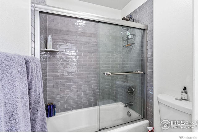 6850 Frying Pan Rd, Boulder, CO 80301 - bathroom featuring toilet and shower / bath combination with glass door