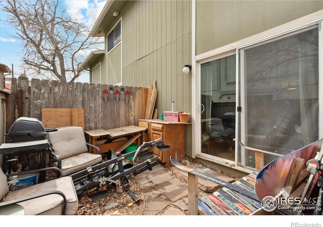 view of patio with fence