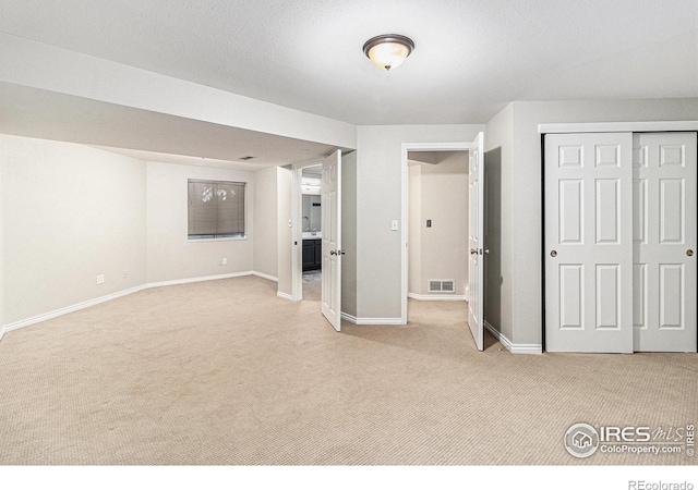 4808 Hopkins Pl, Boulder, CO 80301 - unfurnished bedroom with light carpet, a closet, and baseboards