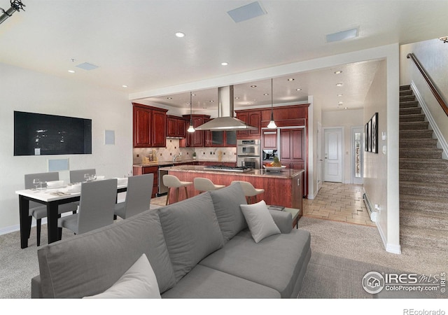 2625 Marys Lake Rd Unit S2, Estes Park, CO 80517 - living area featuring light carpet, stairway, and recessed lighting