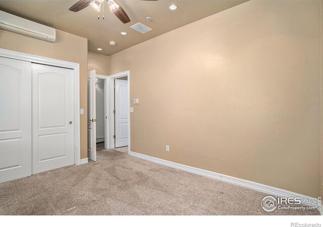 2625 Marys Lake Rd Unit S2, Estes Park, CO 80517 - unfurnished bedroom with a closet, carpet flooring, baseboards, recessed lighting, and a wall unit AC