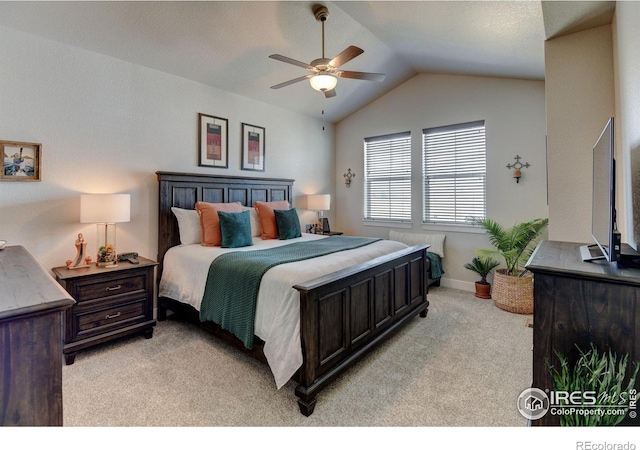 2449 Trio Falls Dr, Loveland, CO 80538 - bedroom featuring ceiling fan, light carpet, baseboards, and lofted ceiling