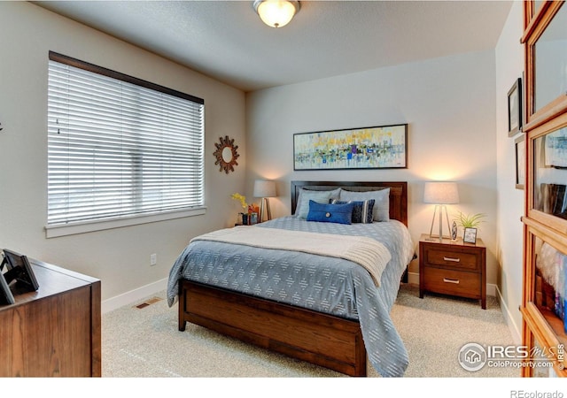 2449 Trio Falls Dr, Loveland, CO 80538 - carpeted bedroom featuring baseboards and visible vents