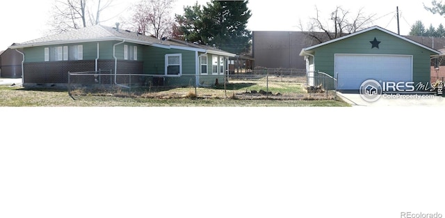 view of front facade with a garage, an outdoor structure, fence, brick siding, and driveway