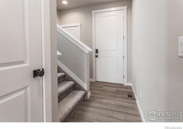 1219 105th Avenue Ct, Greeley, CO 80634 - interior space with baseboards, wood finished floors, and recessed lighting