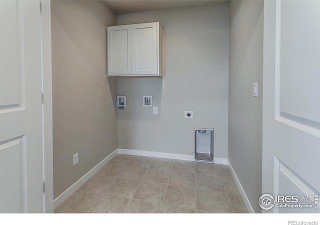 1219 105th Avenue Ct, Greeley, CO 80634 - laundry area featuring baseboards, hookup for an electric dryer, washer hookup, and cabinet space