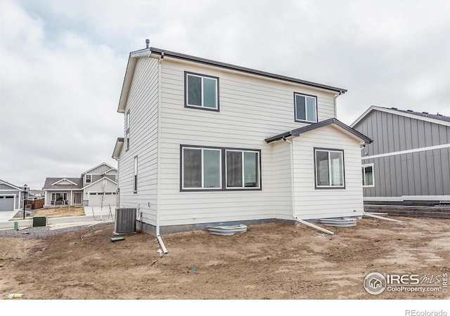 1219 105th Avenue Ct, Greeley, CO 80634 - back of property featuring central AC unit