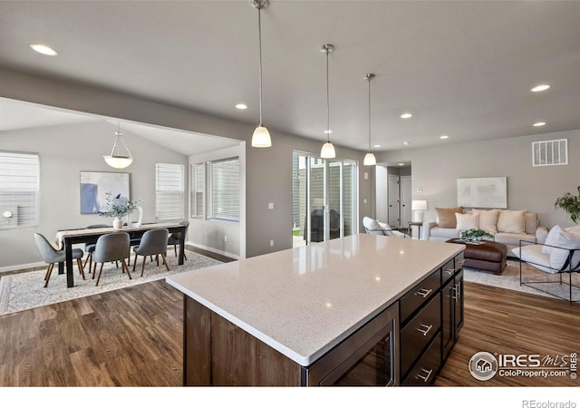 kitchen with recessed lighting, visible vents, wine cooler, and dark wood finished floors