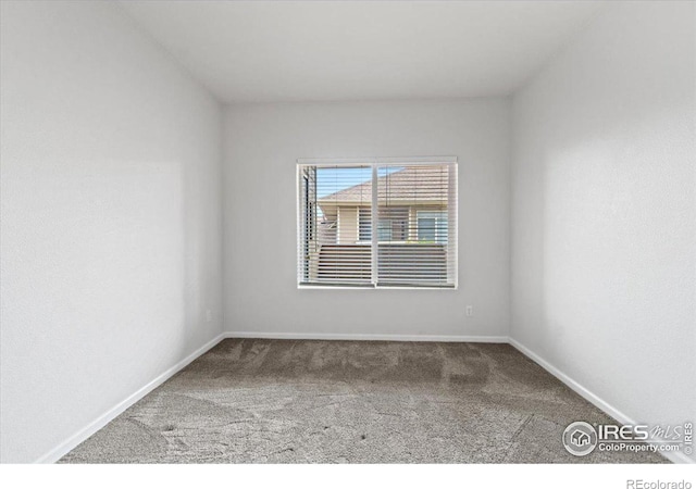 4545 Wheaton Dr Unit 310, Fort Collins, CO 80525 - empty room featuring carpet floors and baseboards