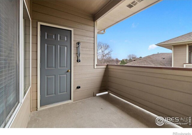 4545 Wheaton Dr Unit 310, Fort Collins, CO 80525 - entrance to property with a balcony