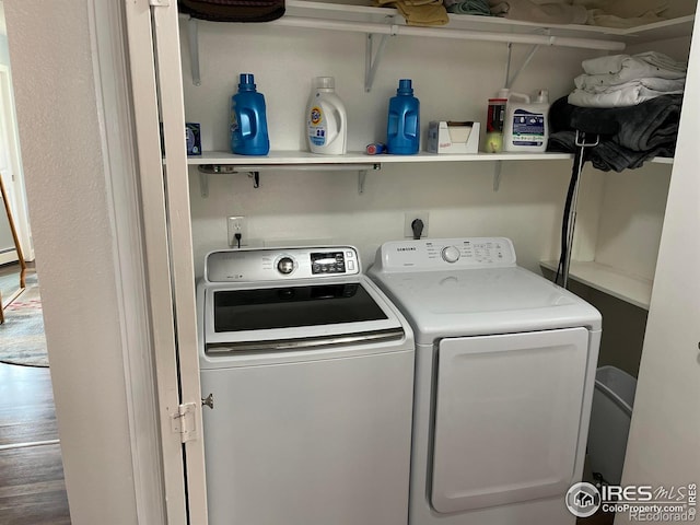 laundry room with washer and clothes dryer