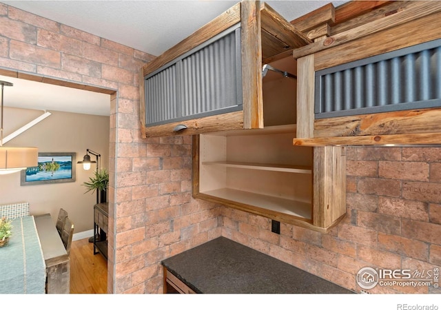 5125 Stetson Creek Ct Unit D, Fort Collins, CO 80528 - kitchen featuring wood finished floors and baseboards