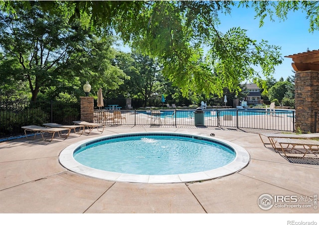 5125 Stetson Creek Ct Unit D, Fort Collins, CO 80528 - community pool with a patio