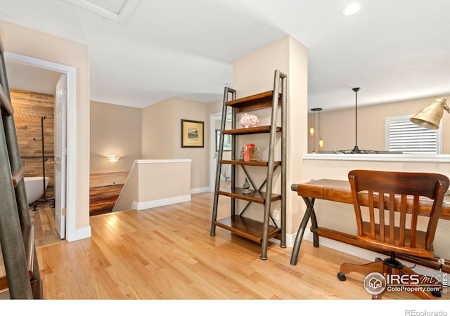 5125 Stetson Creek Ct Unit D, Fort Collins, CO 80528 - corridor featuring wood finished floors, an upstairs landing, and baseboards