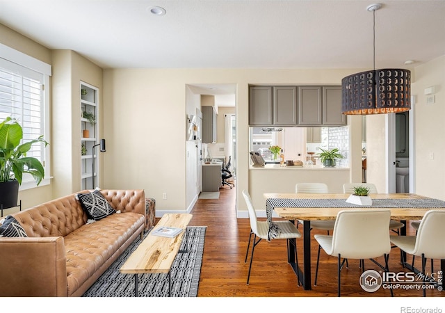 301 Indian Peaks Trl W, Lafayette, CO 80026 - living area with baseboards and wood finished floors
