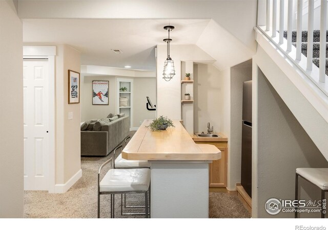 301 Indian Peaks Trl W, Lafayette, CO 80026 - interior space featuring light colored carpet, baseboards, visible vents, and recessed lighting